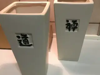 4 høje urtepotte skjuler 