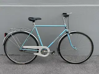 Lyseblå Monark Svensk Kvalitets herre retrocykel. 