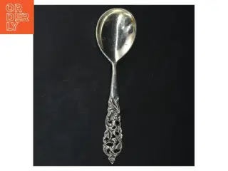 Sølv teske med ornamenteret skaft fra H. Slvplet (str. 19 cm)