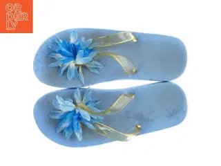 Blå klipklapper med blomst (str. 41 )