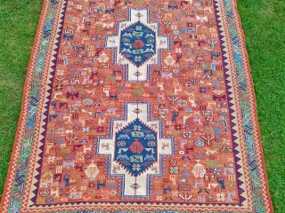 Iranske håndknyttede tæpper sælges