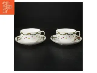 Juleinspirerede tekopper med underkopper fra Royal Copenhagen (str. Ø. 16,5 cm. h 6,5 ø. 10,5 cm)