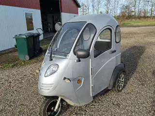 Scotter m kabine