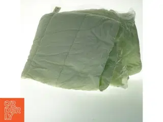 Grønt sengetæppe