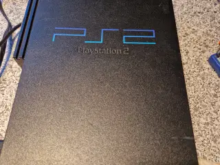 Playstation 2 incl 16 spil /memo.kort