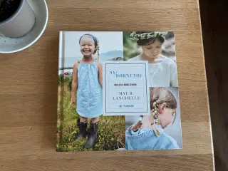Sy børnetøj  af May B. Langhelle