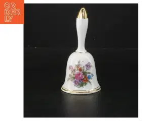 Porcelænsklokke med blomstermønster (str. Ø 6,5 cm længde 14 cm)