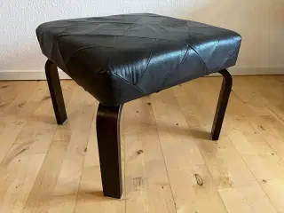 Fodskammel med sort læder