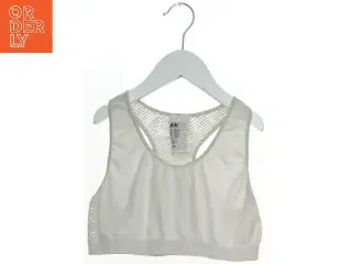 Sports-bh med mesh detaljer fra H&M (str. 158)