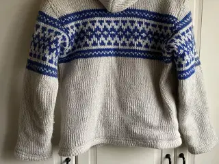 Strik hættejakke i uld med stof foer