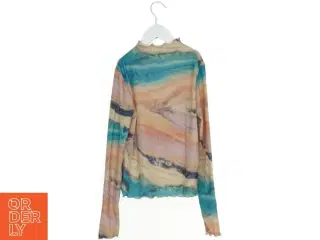 Langærmet bluse med bølgemønster fra H&M (str. 146)