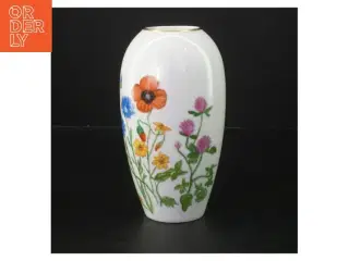 Porcelænsvase med blomsterdekoration (str. 16 cm)