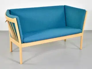 Sofasæt fra kvist med to sofaer med blå/grønt polster