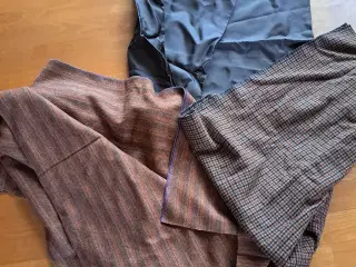 Metervare stof i brunlige nuancer .