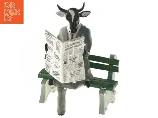 Kofigurine læsende avis fra CowParade (str. 10 cm)