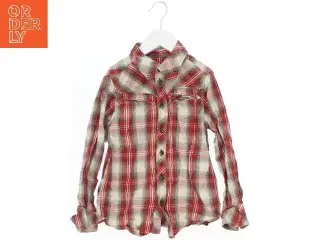 Skjorte i ternet design fra H&M (str. 122)