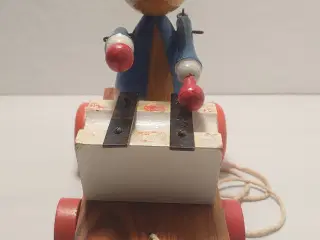 Vintage trækdyr (kat) der spiller xylofon. Ca 1960