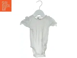 Hvid bodystocking til baby fra H&M (str. 74)