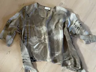 Blusen til brug over en top