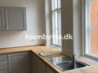 Hjembytte - Krystalgade