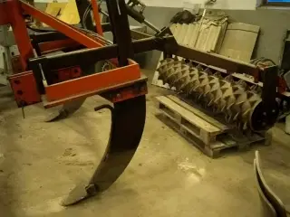 - - - - - - 2 tands med hydraulisk tandpakkervalse