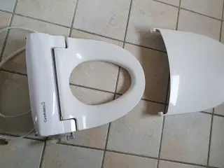Skylle-tørre-toilet med varme