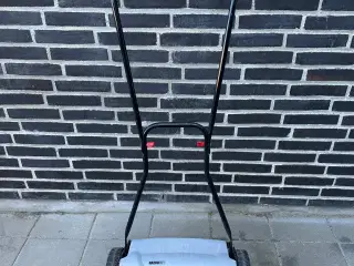 Håndskubber til græsset