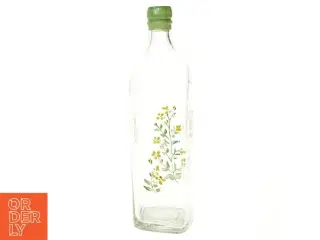 Gammel flaske vase med blomstermotiv (str. 27 x 7 cm)