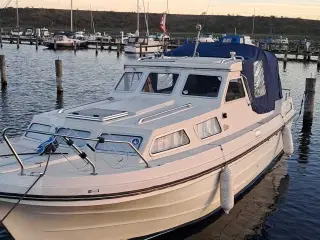 Velholdt Myra 25 med nyere motor og ny kaleche