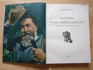 hunting with camera and gun, af Karel Hájek