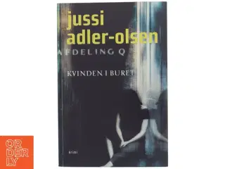 Kvinden i buret : krimi af Jussi Adler-Olsen (Bog)