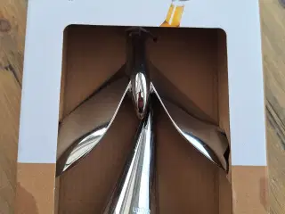 oplukker