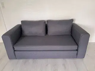 grå sovesofa i fin stand