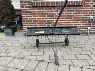 Rive til plænetraktor