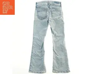 Lyseblå jeans med lommer fra H&M (str. 128)