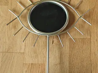 Bordspejl udformet som et øje