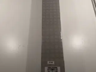 Spændebånd med pløkke