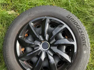 4 stk bridgestone vinterdæk med stålfælge sælges