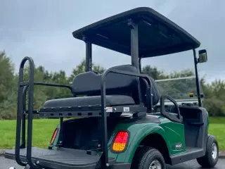 Golfbil + flip-flop lad