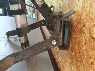 El lift til plæneklipper 