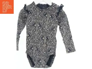 Langærmet body med blomsterprint fra Magasin (str. 80)
