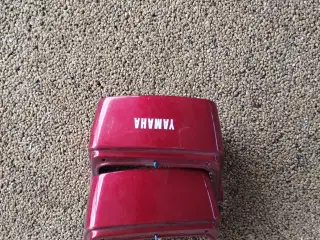 Bag skjolde til Yamaha