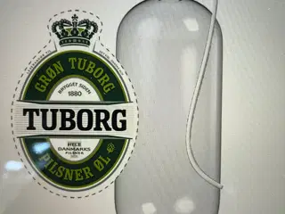 Grøn Tuborg på fustage