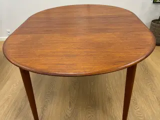 Smukt rundt Spisebord med 3 tillægsplader, Design 