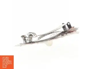 Sølvfarvet hårspænde (str. 7 x 3 cm)