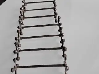 Metalholder til knive, til borddækning