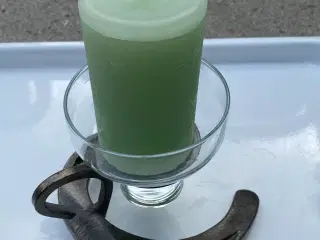  Hestesko sort jern med bloklys i glas, kr. 60,-