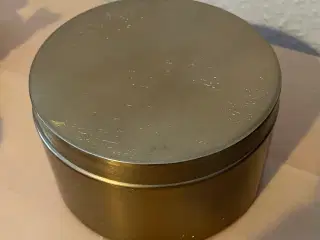 Gylden metaldåse/-æske med et løst låg
