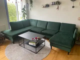 Stor mørkegrøn sofa