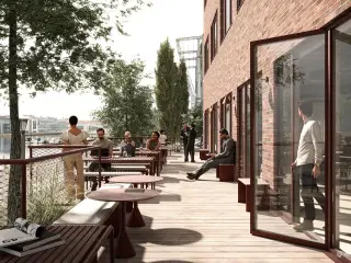 Exceptionel flerbrugerejendom i første parket til vandet